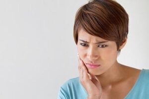 Dental Emergency - Woman with toothache emergency dentist emergency dentist Orlando emergency dentist near me emergency dentistry